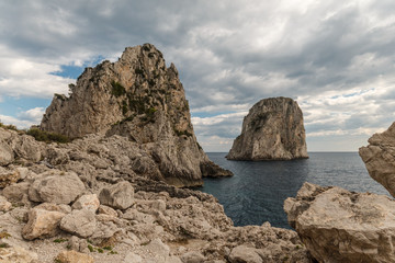Fototapeta na wymiar View of Capri island (Italy) with Faraglioni