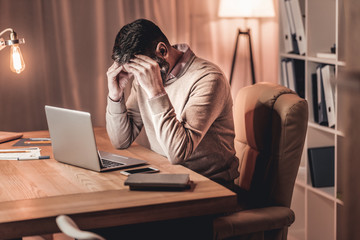 Financial problems. Distressed disappointed man trying to find a job