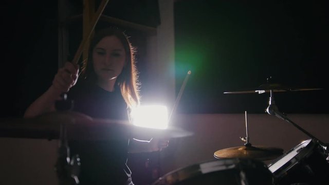 Teen rock music - Passionate dashing girl percussion drummer perform music break down