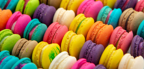 A french sweet delicacy, macaroons variety closeup.macaroon colourful texture.