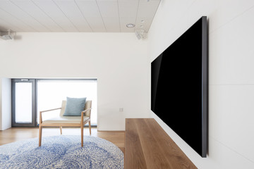 television side view in a white interior