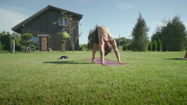 yoga on grass walking through