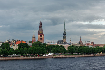 Fototapeta premium View of the spiers of the cathedrals of the old city of Riga, from the Daugava river
