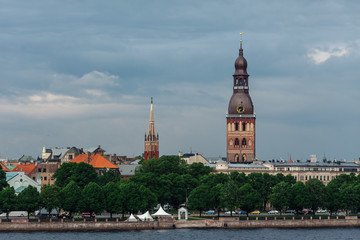 Obraz premium View of the spiers of the cathedrals of the old city of Riga, from the Daugava river