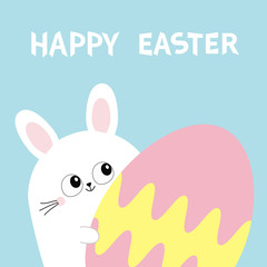 Happy Easter. White bunny rabbit holding big painted egg. Funny head face, eyes, ears. Cute kawaii cartoon character. Baby greeting card. Blue background. Flat design.