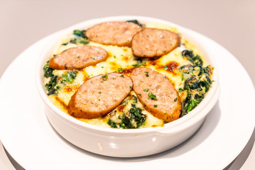 baked spinach with cheese and sausage