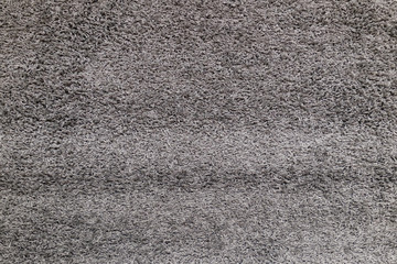 Gray carpet textures with long fibers for background, natural textile