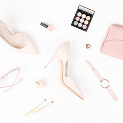 Female fashion accessories and cosmetics in pink color, flat lay.