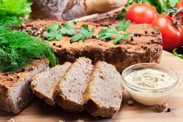 Fototapeta na wymiar Traditional delicious meat pate with chicken liver on cutting board