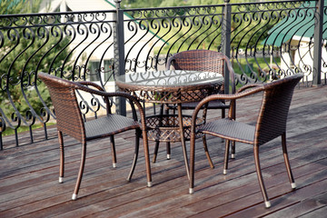 wicker furniture on the summer terrace