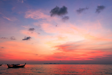 Fototapeta na wymiar Sightseeing travel concept:Traditional thai boats at sunset beach
