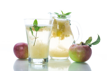 summer sweet cold compote of fresh apples with a sprig of mint