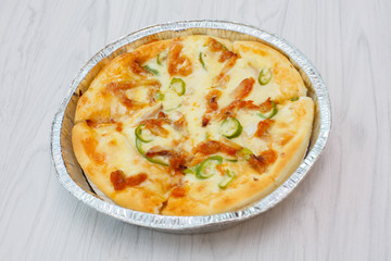 A pizza that has just been baked.