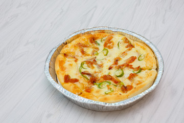 A pizza that has just been baked.
