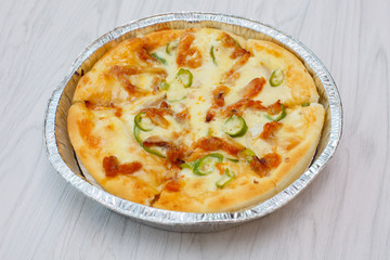 A pizza that has just been baked.