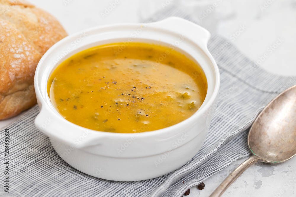 Poster vegetable soup in white bowl