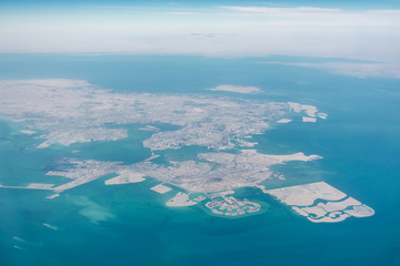 Fototapeta na wymiar High altitude aerial view of the north part of Bahrain