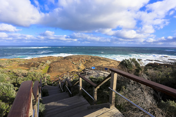 Ocean view against blue sky as seen from Cape Leeuwin lighthouse attraction at western australia