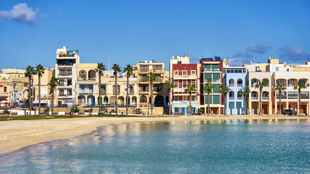 Colored houses at Pretty Bay beach in Birzebbuga, Malta