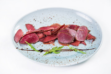 ostrich basturma,with arugula