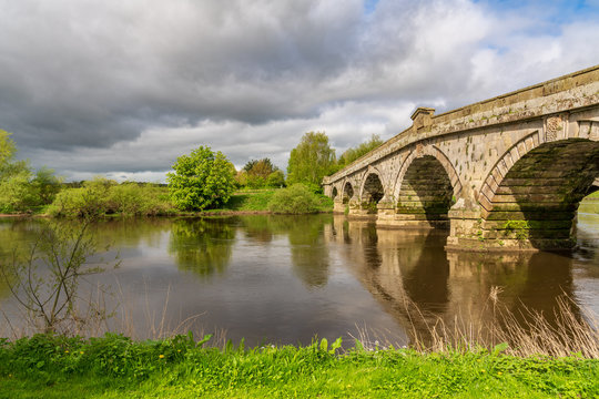 Atcham Old Bridge over the River Severn in Atcham, near Shrewsbury, Shropshire, England, UK