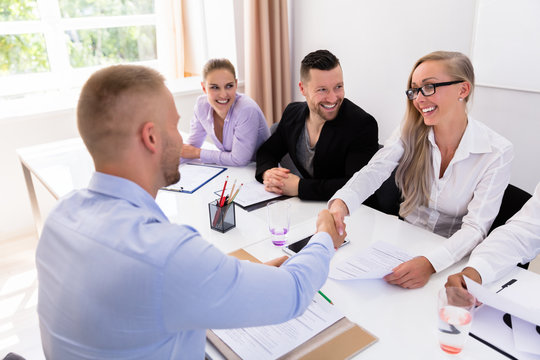 Businessman Shaking Hands At Interview