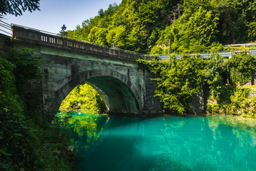 Fototapeta na wymiar Bridge over the Soca river in Most na Soci, Slovenia