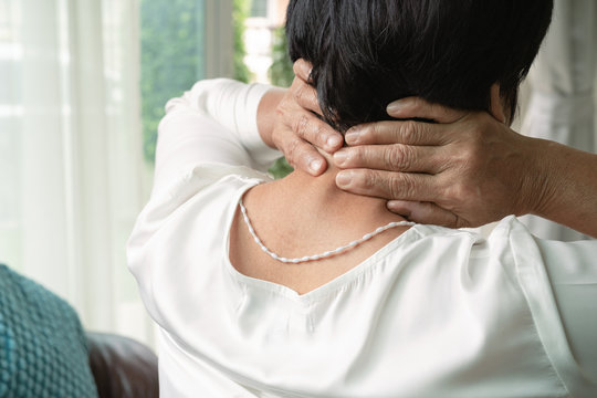 old woman suffering from neck pain, closeup, health problem concept