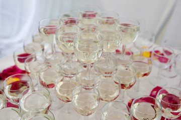 champagne glasses and rose petals