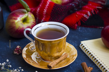 A cup of tea with apples, autumn mood
