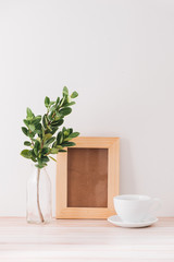 Styled tabletop, empty frame, painting art poster interior mock-up