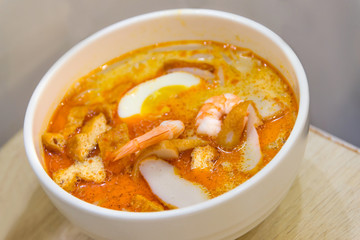 Laksa noodles is a spicy soup popular in Singapore local delicious food