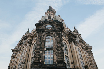 Fototapeta na wymiar The church is called Frauenkirche against the blue sky in Dresden in Germany.