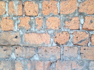 old weathered pink tuff stone