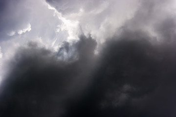 Naklejka na ściany i meble storm cloud on sunny day