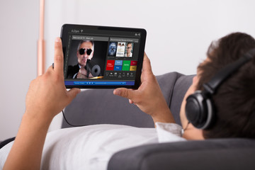 Man watching movie on website