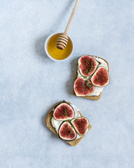 Toasted whole wheat bread with figs, ricotta (cream cheese), thyme, honey
