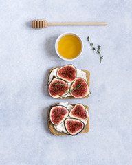 Toasted whole wheat bread with figs, ricotta (cream cheese), thyme, honey