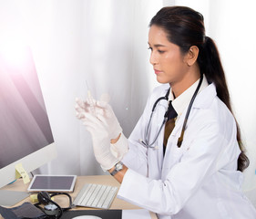 Doctor Nurse in white blue shirt with stethoscope and rubber gloves