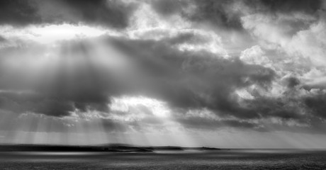 Dramatic sky over coastline, Cornwall