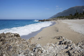 Albanian coast.beautiful view on the  rock sea shore,blue sea and wave.