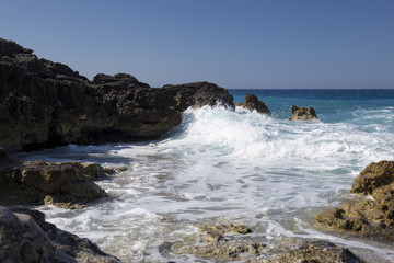 Albanian coast.beautiful view on the  rock sea shore,blue sea and wave.
