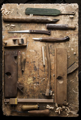 Hand tools Wood on an old wooden workbench