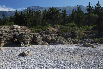 Albanian coast.beautiful view on the  rock sea shore,blue sea and wave.