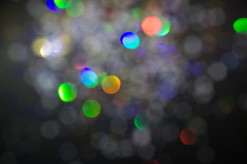 Smoky foggy background. Colorful abstract bokeh light on the gray background