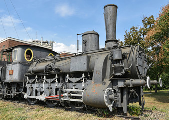Fototapeta na wymiar Old rusty locomotive outdoor