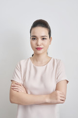 Obraz premium Confident successful smiling business woman executive with folded arms