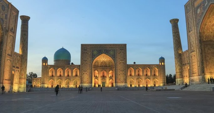 Samarkand at dusk. Zoom in view of Registan square and Tilya-Kori madrasah
