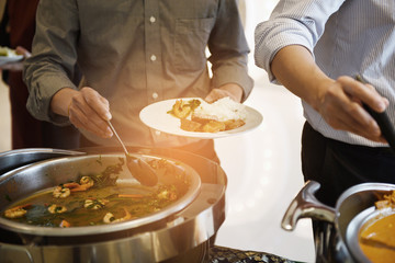 scooping the food, Buffet food at restaurant, catering food, food wedding celebration, dining