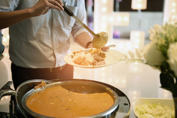 scooping the food, Buffet food at restaurant, catering food, food wedding celebration, dining